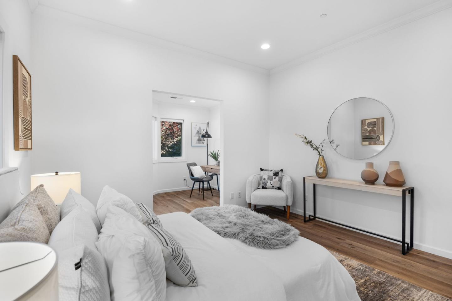 415 El Centro Road Hillsborough, CA 94010 - Photo 31 of 60 a spacious bedroom with a bed a couch and dresser