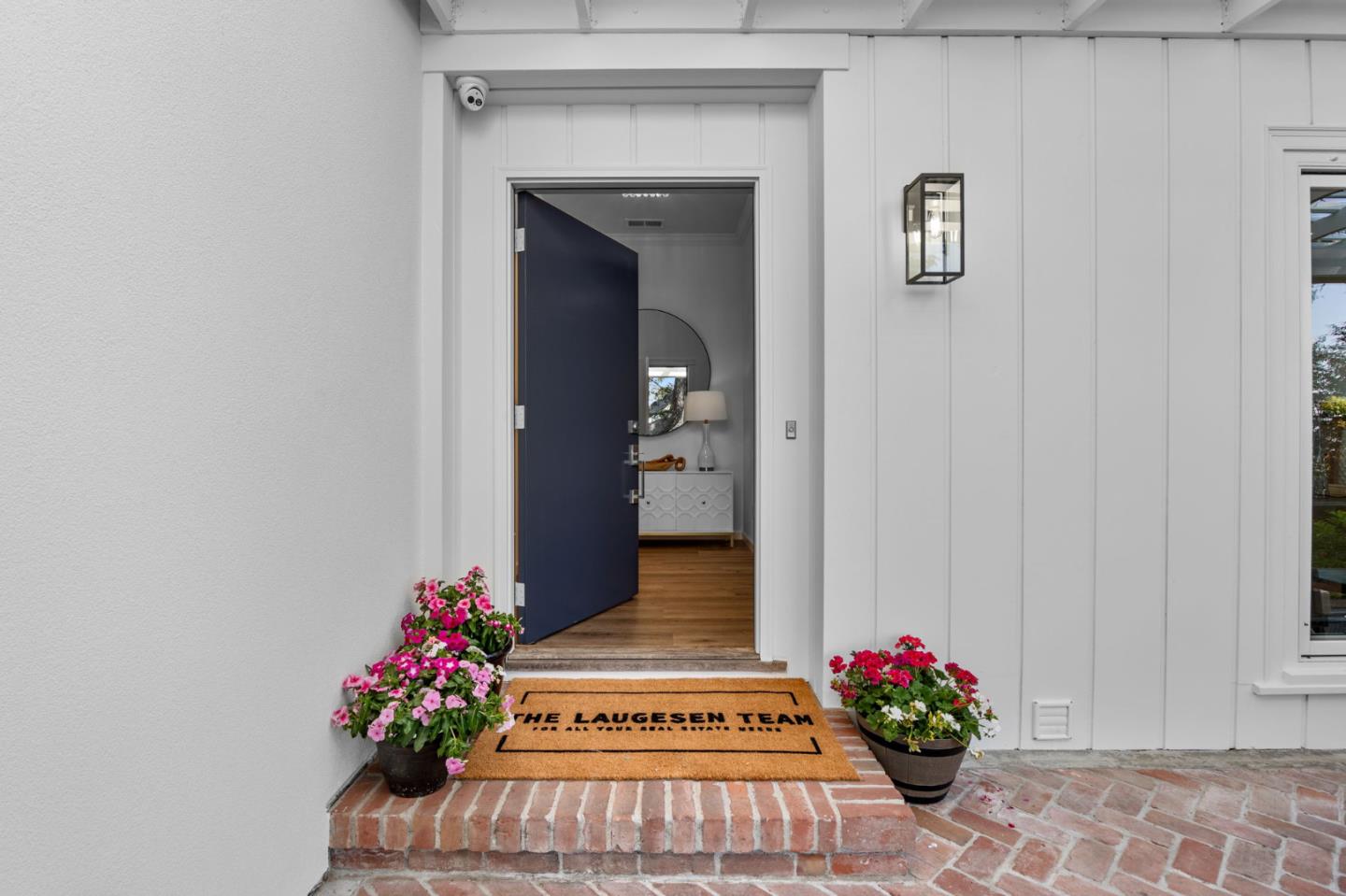 415 El Centro Road Hillsborough, CA 94010 - Photo 4 of 60 a view of a entryway door with flower pots