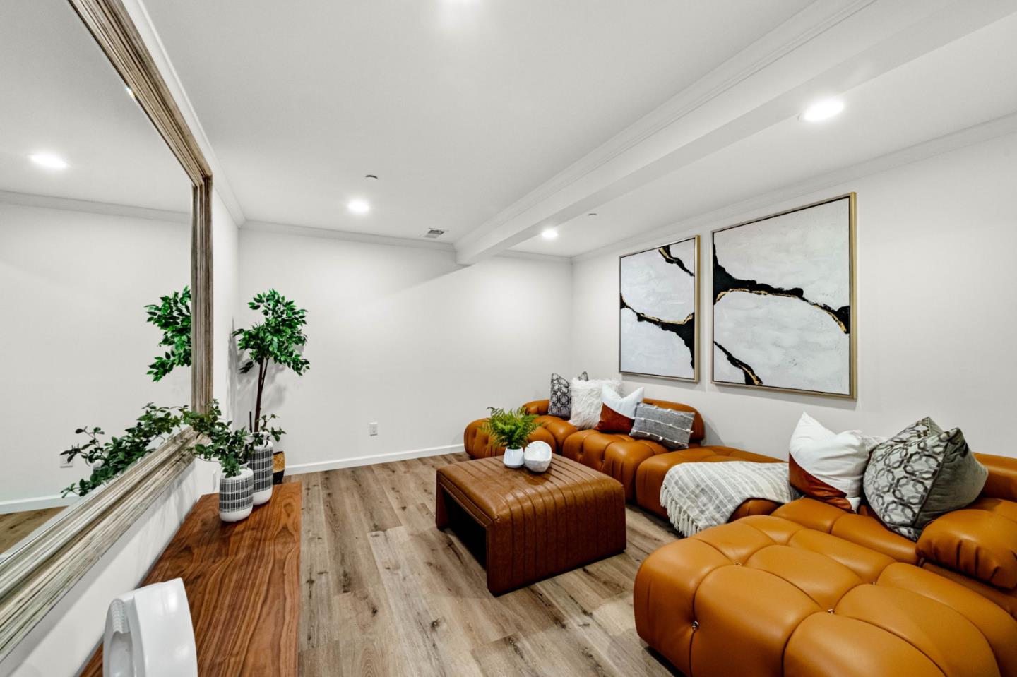 415 El Centro Road Hillsborough, CA 94010 - Photo 43 of 60 a living room with furniture potted plant and wooden floor