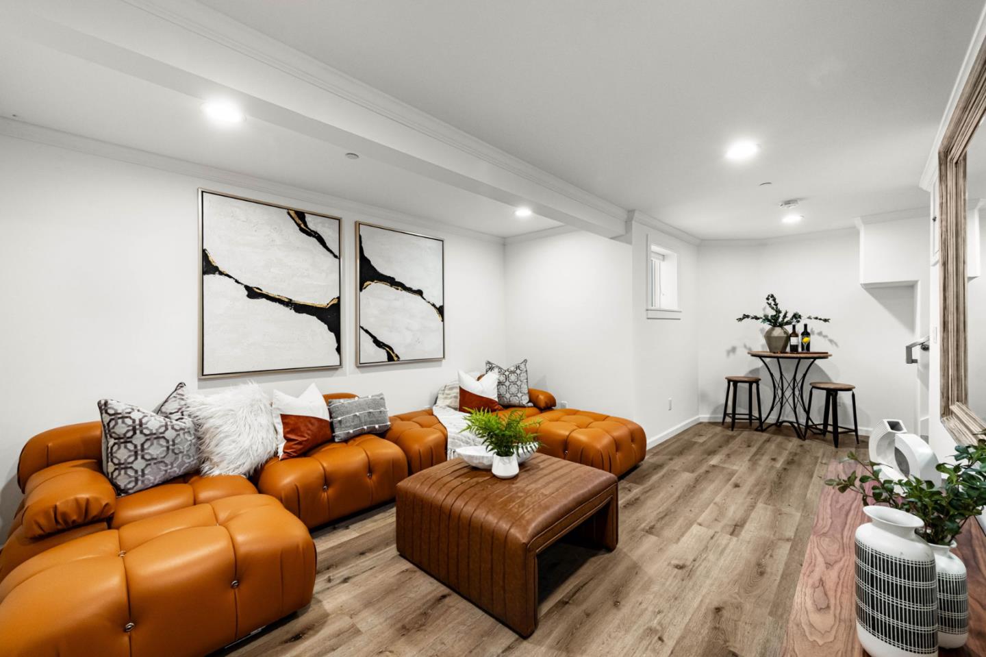 415 El Centro Road Hillsborough, CA 94010 - Photo 44 of 60 a living room with furniture and wooden floor