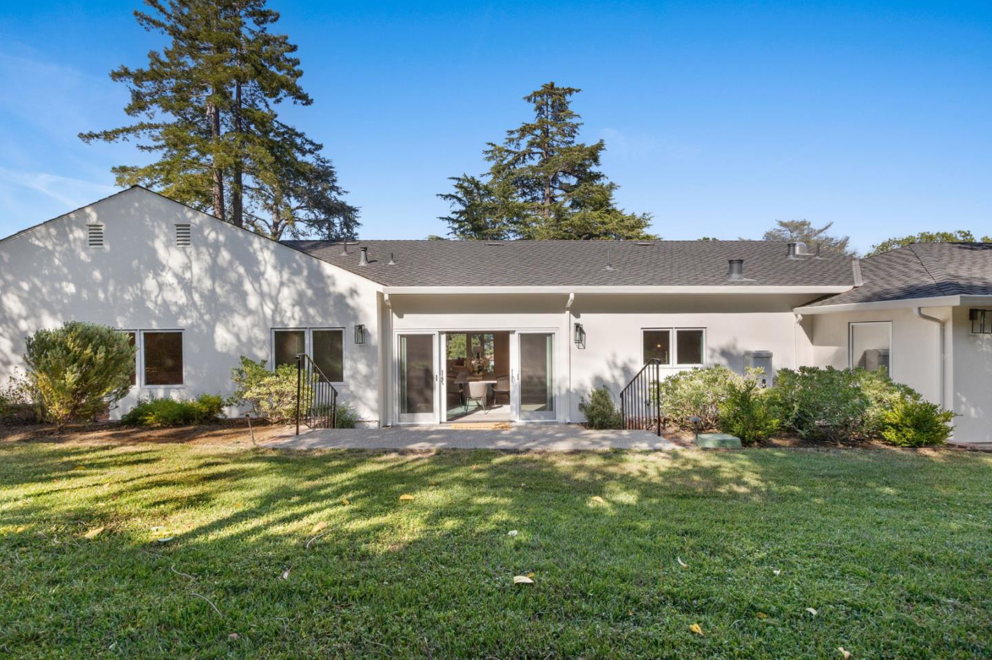 415 El Centro Road Hillsborough, CA 94010 - Photo 46 of 60 a front view of a house with a yard