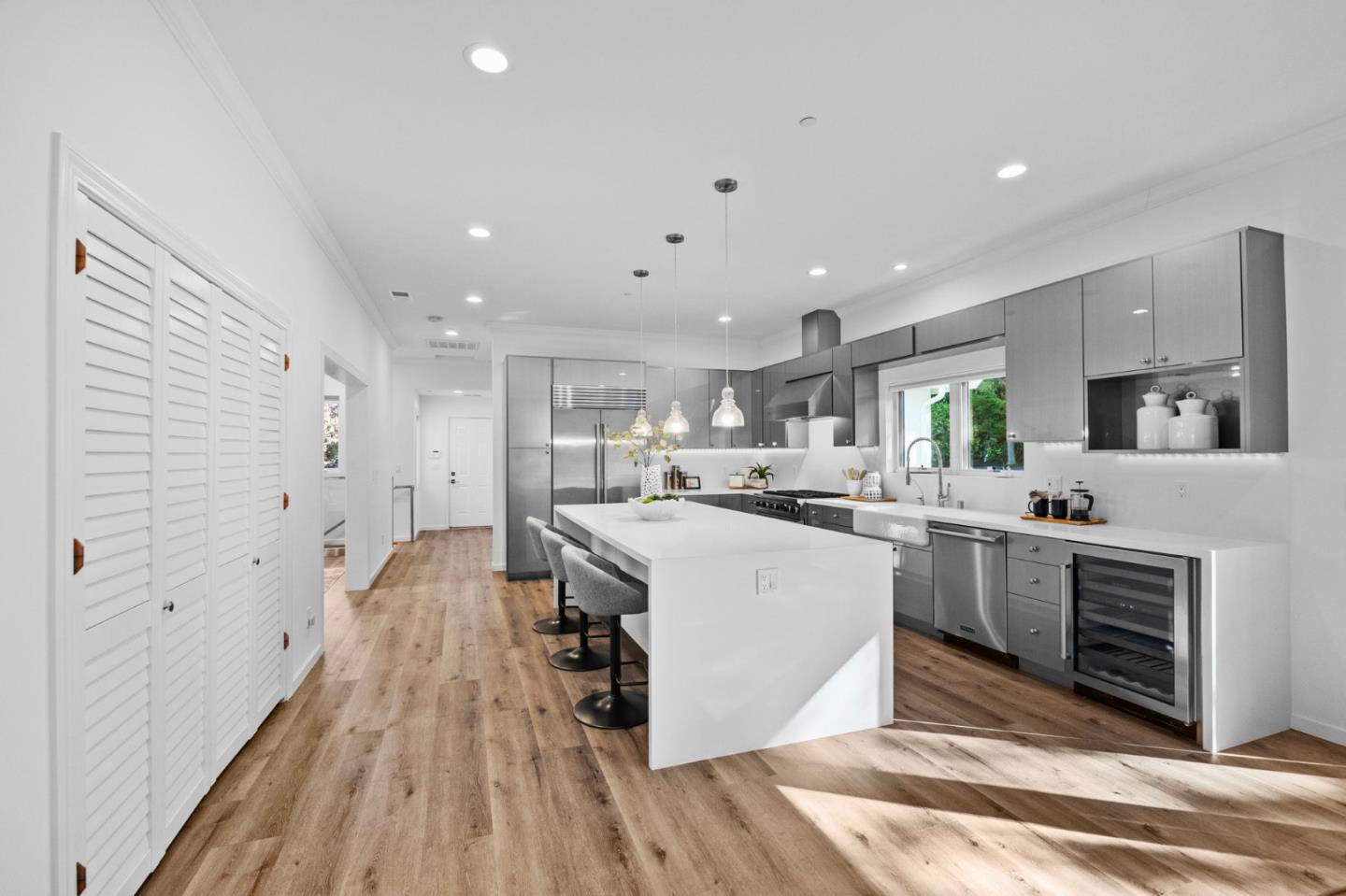 415 El Centro Road Hillsborough, CA 94010 - Photo 5 of 60 a kitchen with cabinets and wooden floor