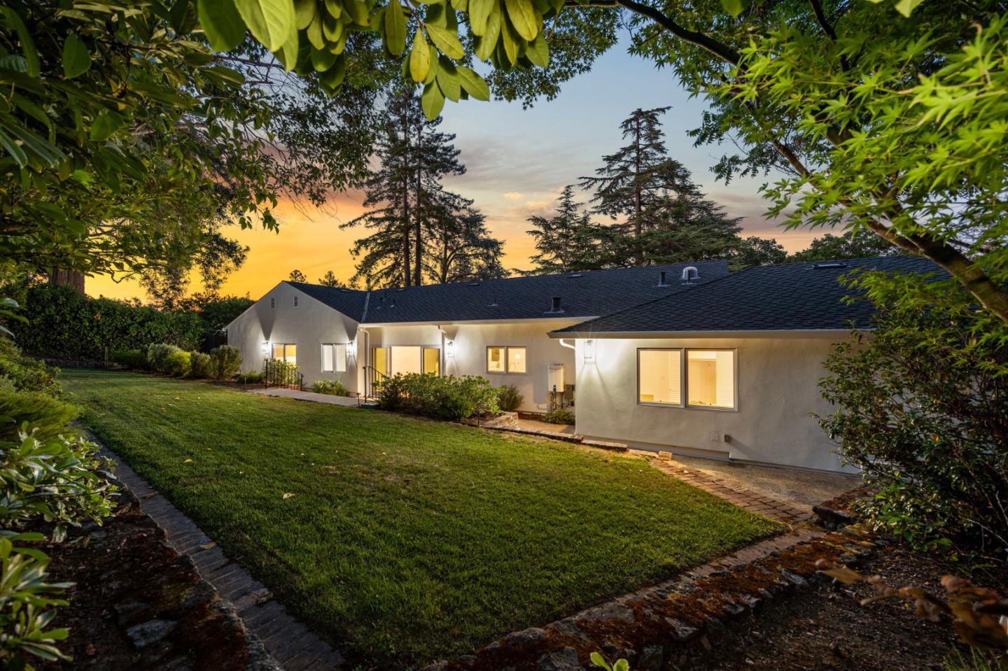 415 El Centro Road Hillsborough, CA 94010 - Photo 51 of 60 a front view of a house with a yard