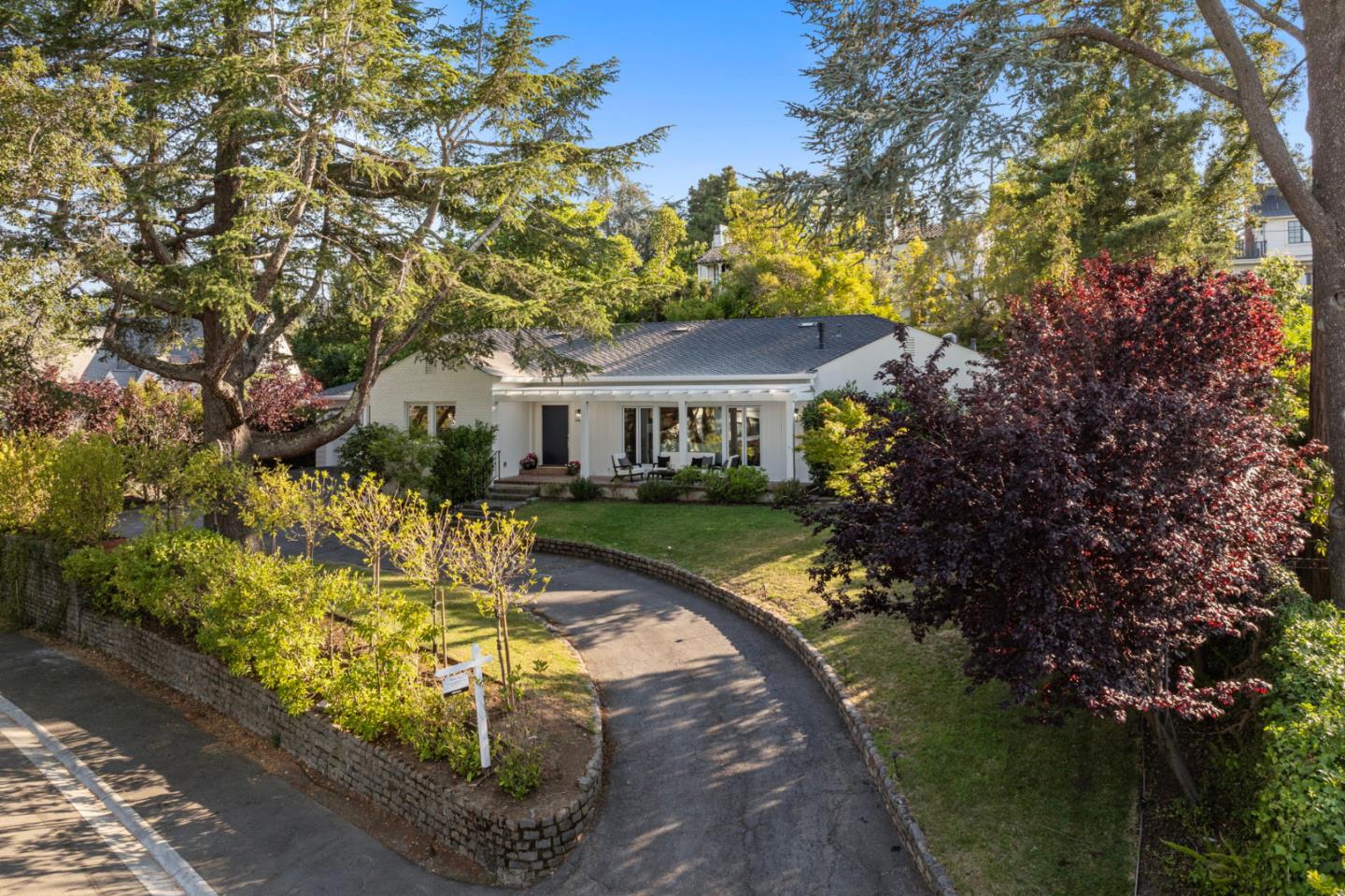415 El Centro Road Hillsborough, CA 94010 - Photo 54 of 60 a view of a house with a yard