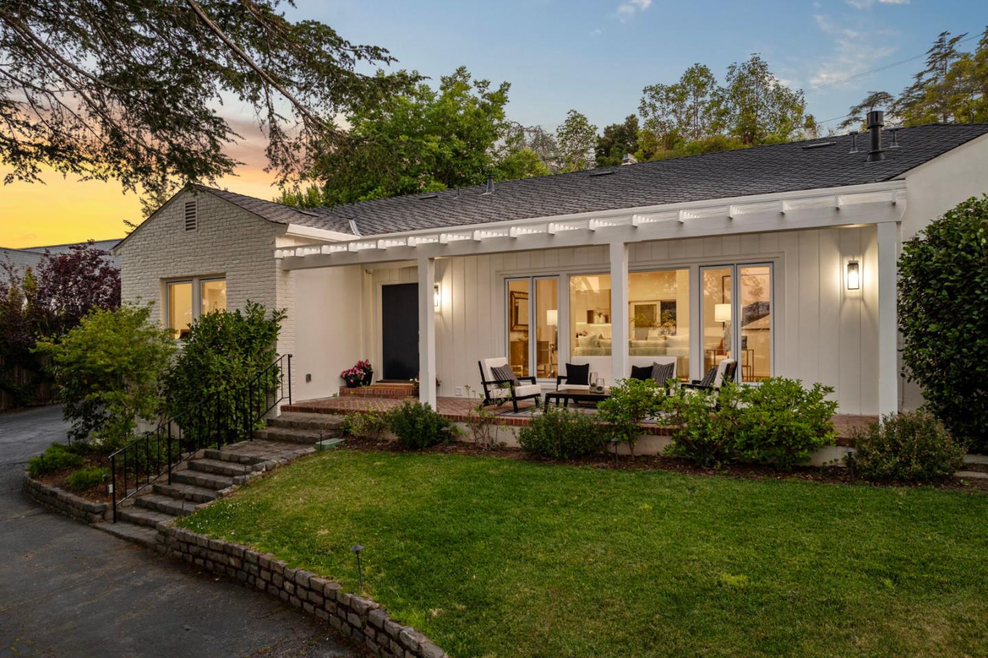 415 El Centro Road Hillsborough, CA 94010 - Photo 56 of 60 a front view of house with yard and outdoor seating