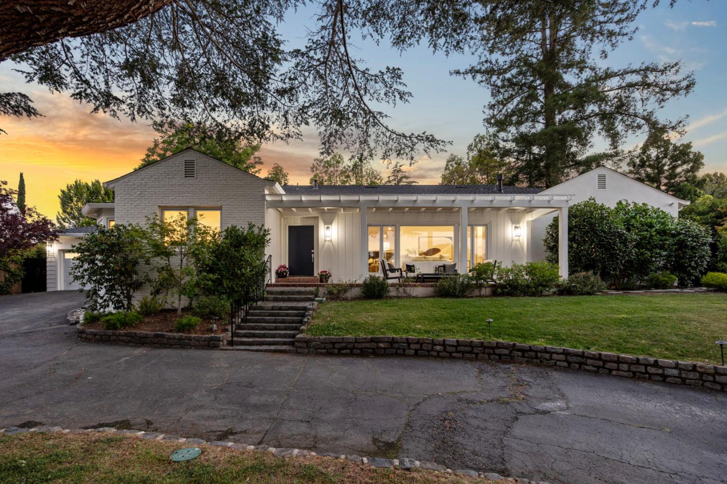 415 El Centro Road Hillsborough, CA 94010 - Photo 57 of 60 a front view of a house with a yard