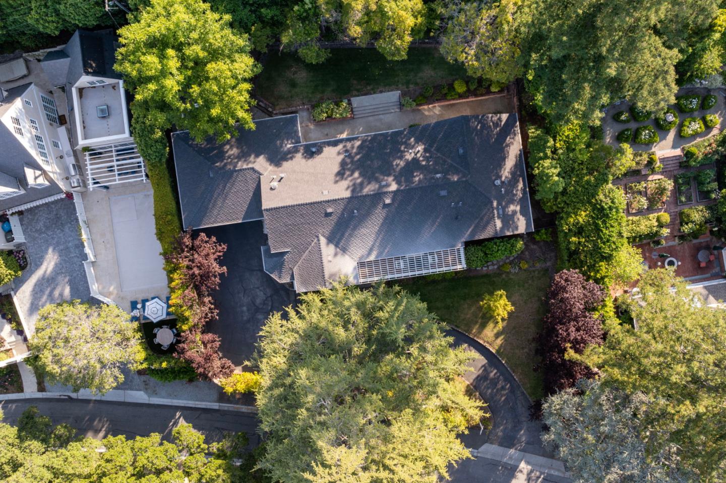 415 El Centro Road Hillsborough, CA 94010 - Photo 60 of 60 an aerial view of a house with a yard and a garden