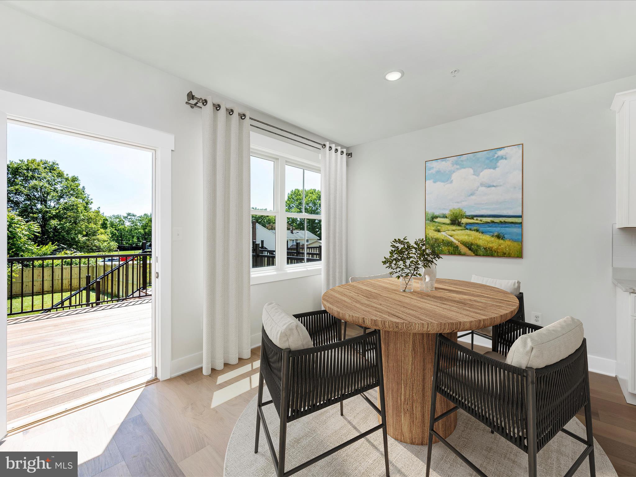 252 South Carroll Street Frederick, MD 21701 - Photo 17 of 68 a dining room with furniture and a floor to ceiling window