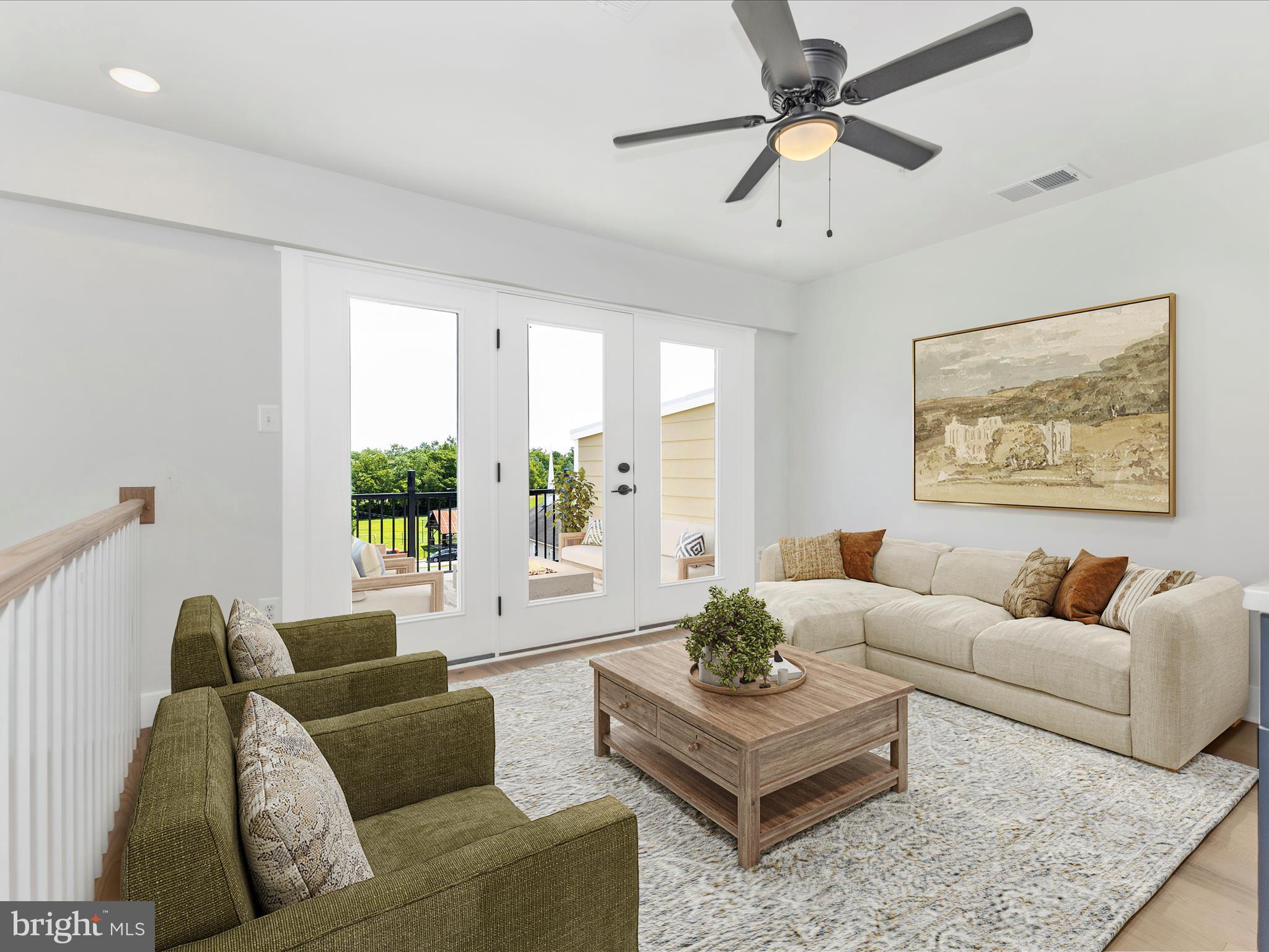 252 South Carroll Street Frederick, MD 21701 - Photo 32 of 68 a living room with furniture a large window and a rug