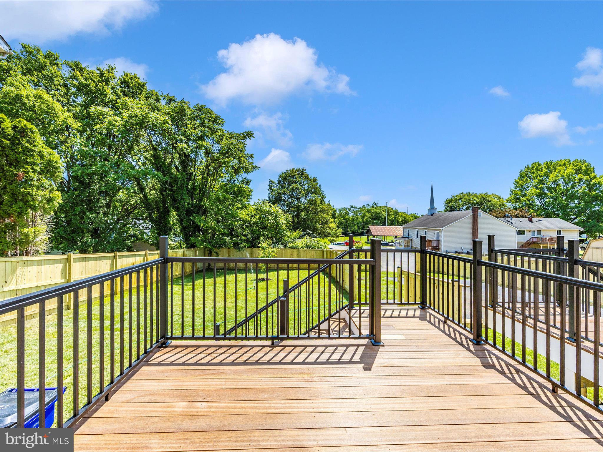 252 South Carroll Street Frederick, MD 21701 - Photo 53 of 68 a view of a balcony with wooden floor