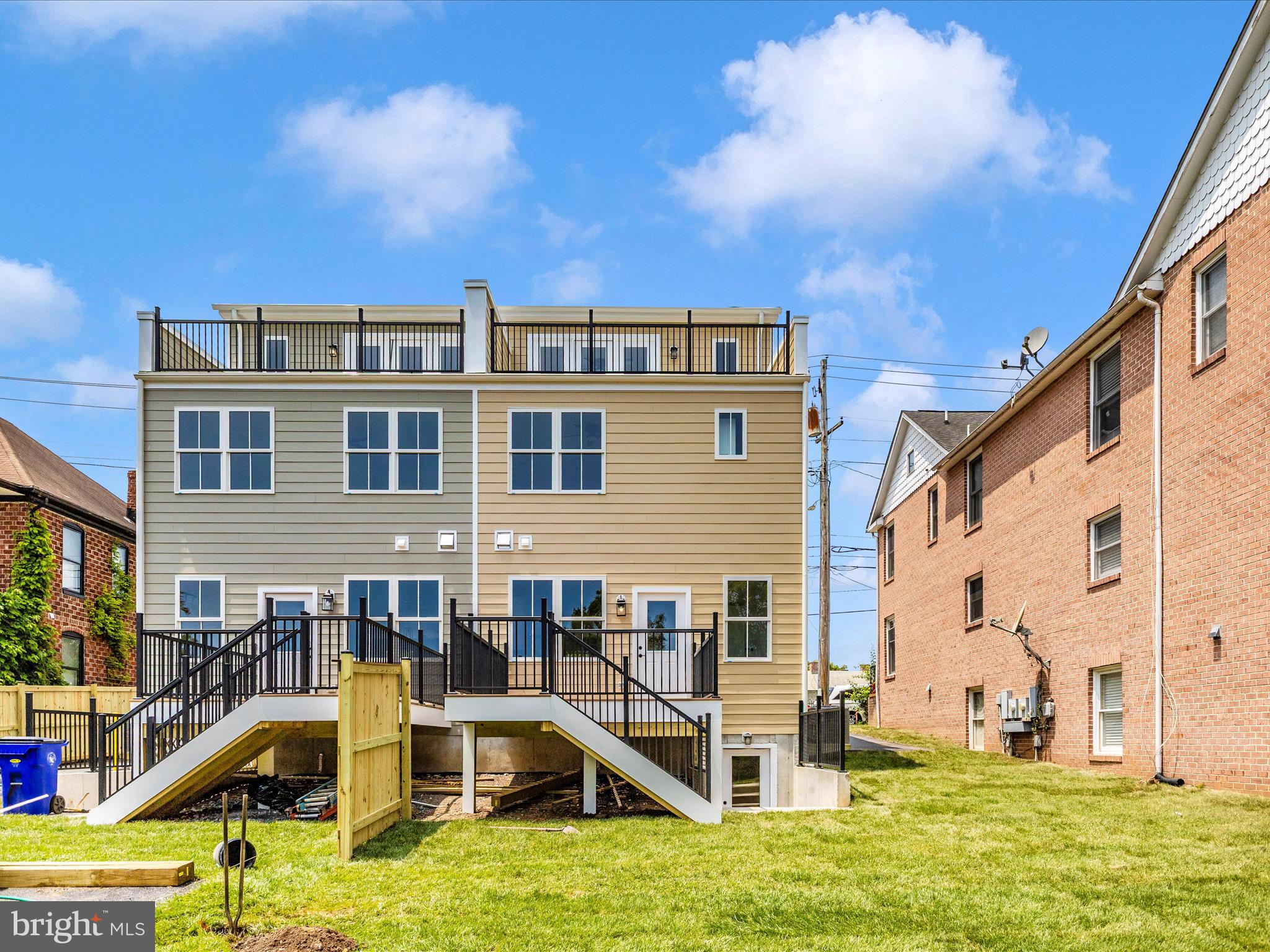 252 South Carroll Street Frederick, MD 21701 - Photo 57 of 68 a view of a house with swimming pool and sitting area