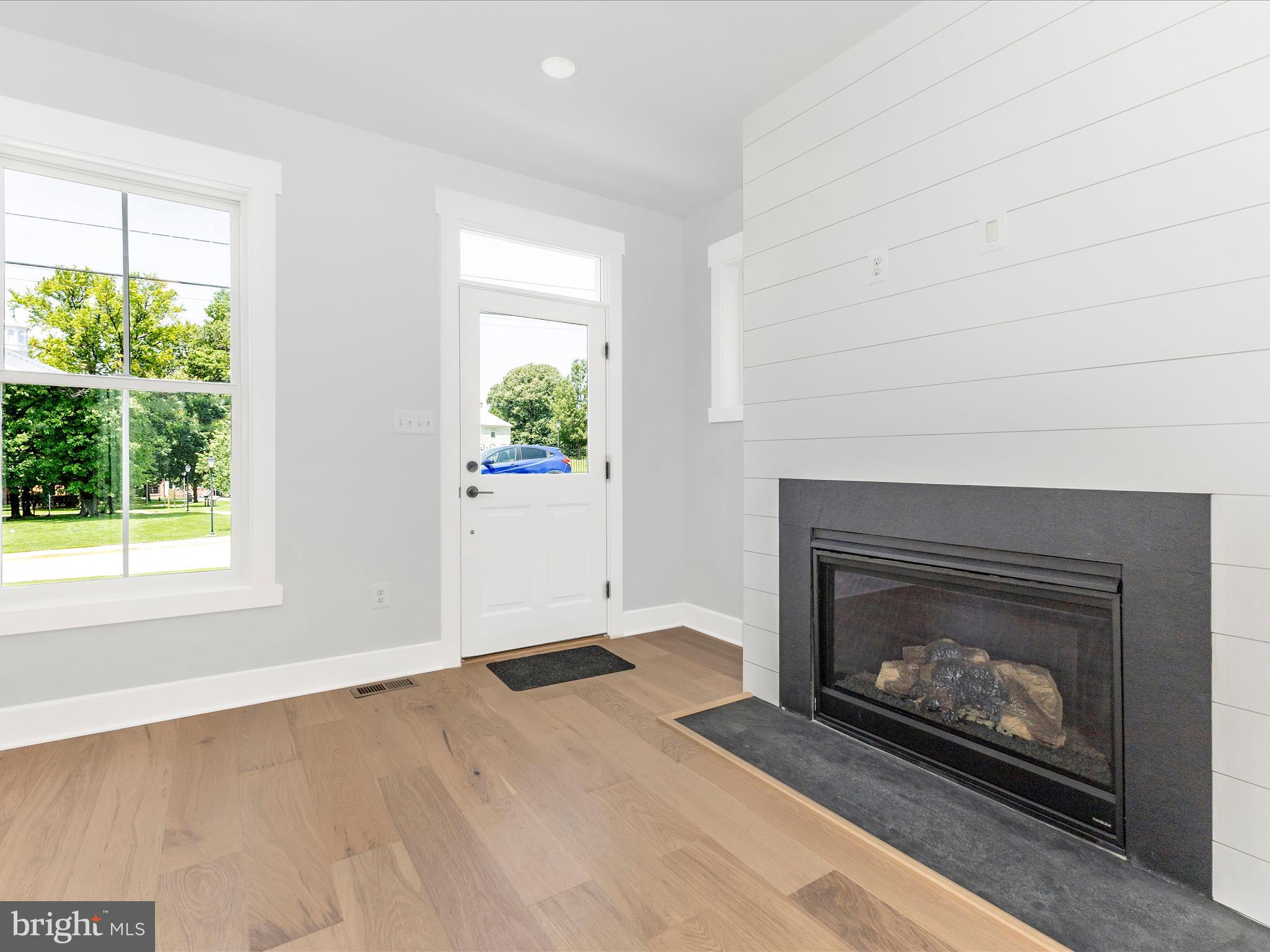 252 South Carroll Street Frederick, MD 21701 - Photo 9 of 68 a living room with a fireplace