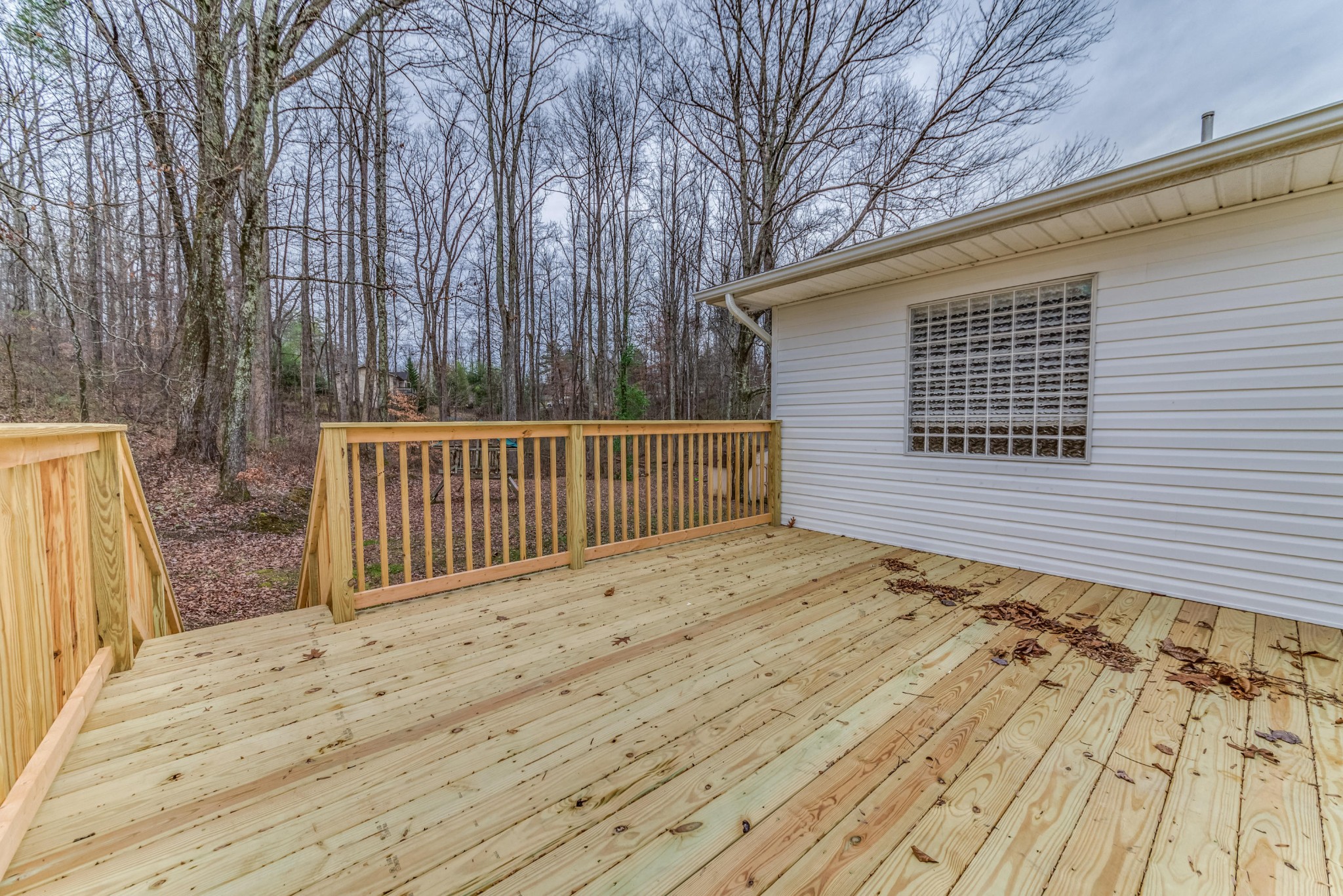 3405 Shagbark Road Powell, TN 37849 - Photo 18 of 20 a view of backyard with wooden fence and large trees