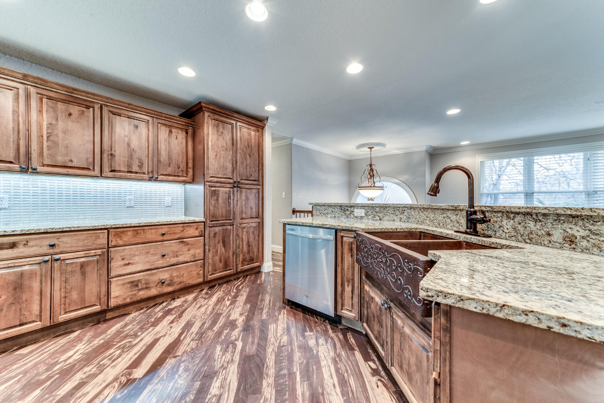 3405 Shagbark Road Powell, TN 37849 - Photo 6 of 20 a kitchen with granite countertop a sink stainless steel appliances and cabinets