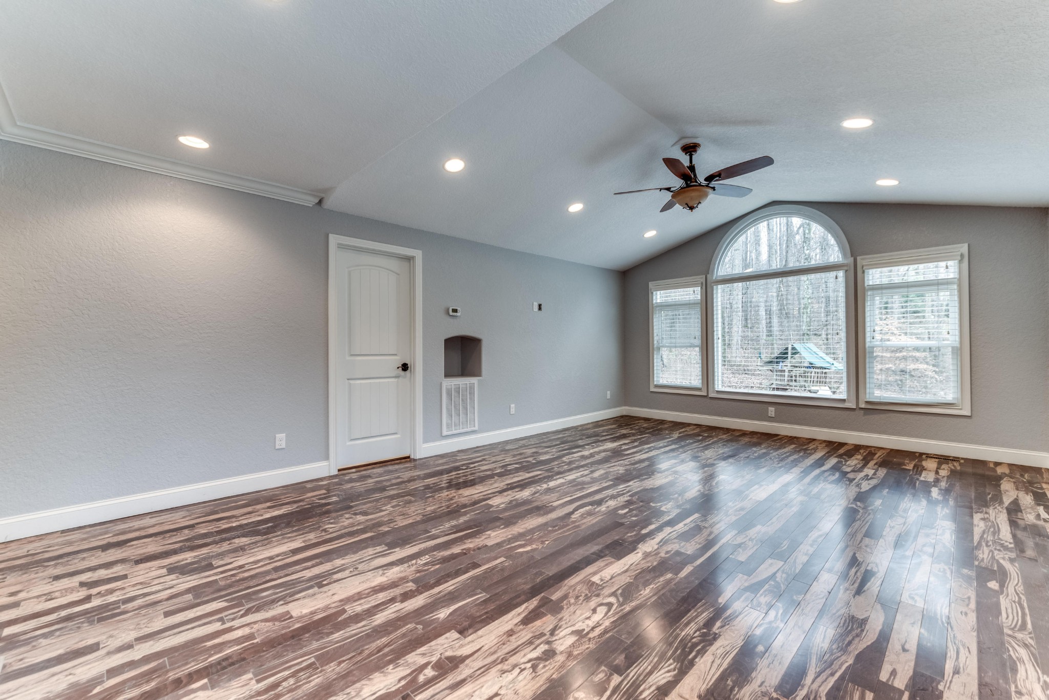 3405 Shagbark Road Powell, TN 37849 - Photo 8 of 20 an empty room with wooden floor and windows