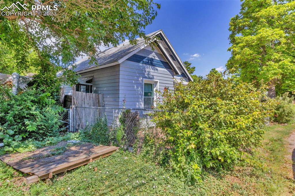 1330 West 3rd Street Florence, CO 81226 - Photo 4 of 34 a aerial view of a house with a yard