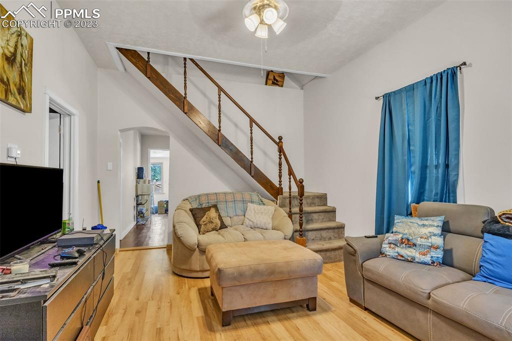 1330 West 3rd Street Florence, CO 81226 - Photo 5 of 34 a living room with furniture and a flat screen tv
