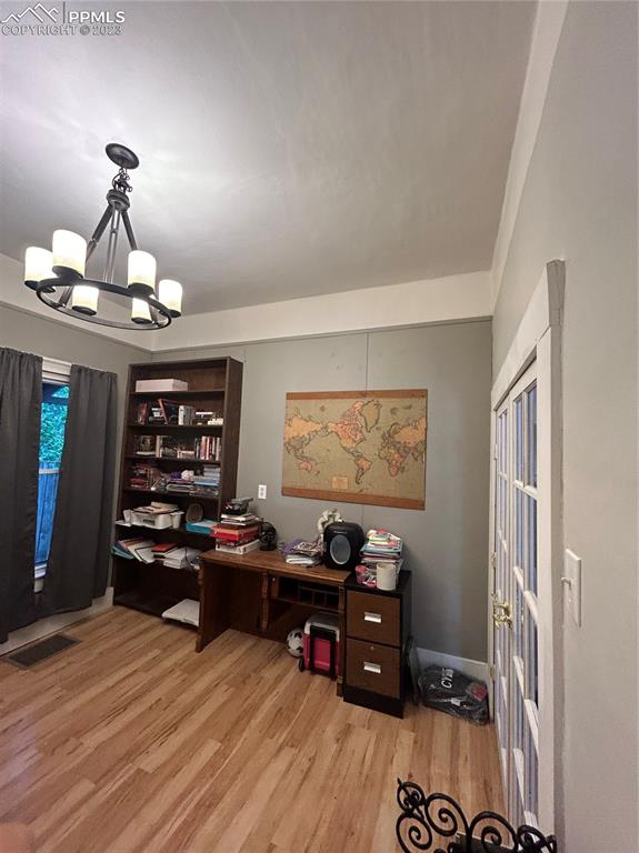 1330 West 3rd Street Florence, CO 81226 - Photo 7 of 34 a view of a room with furniture and wooden floor