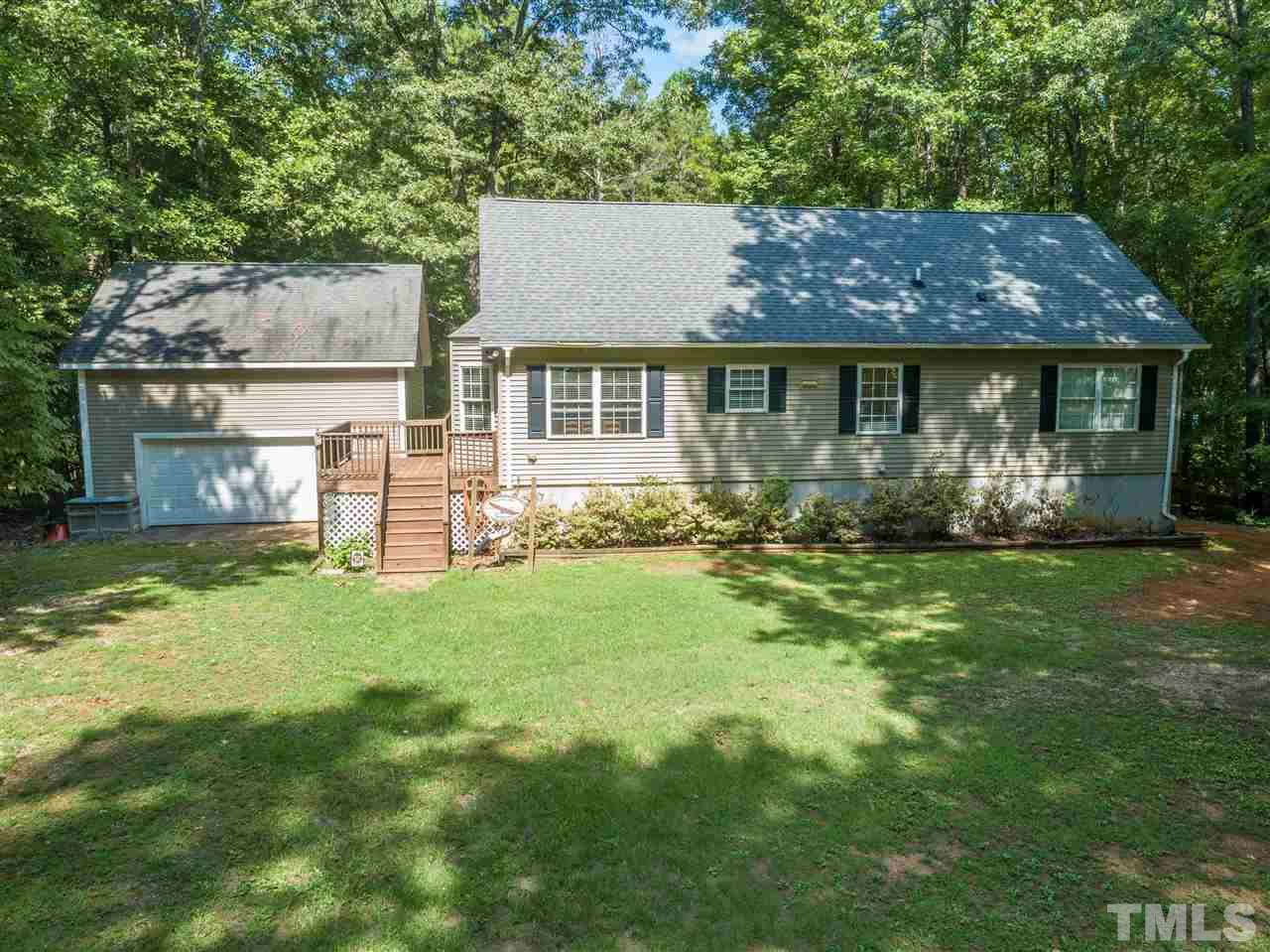 9563 Whippoorwill Ridge Road Bullock, NC 27507 - Photo 3 of 30 The Garage is detached with steps to the upper level. Lots of room for Lake Toys!