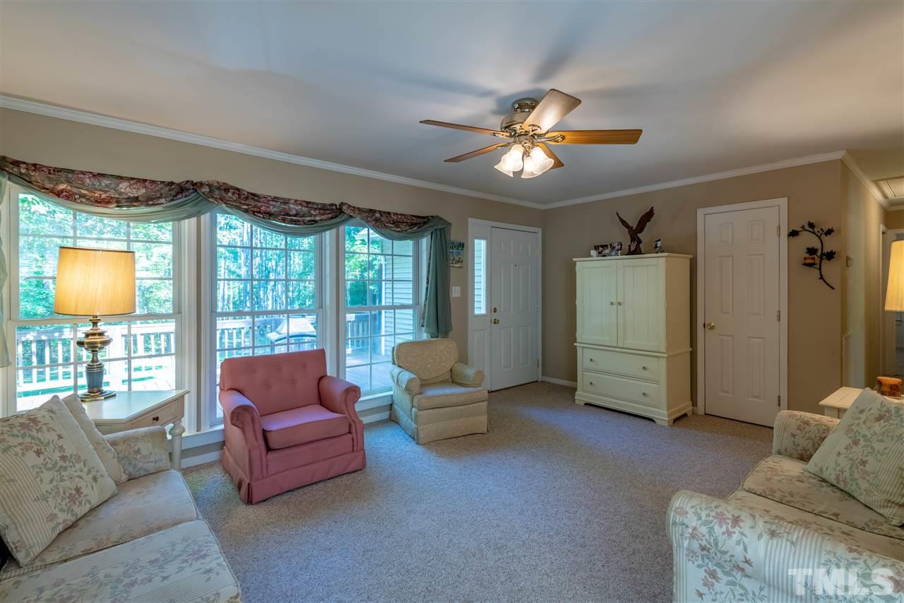 9563 Whippoorwill Ridge Road Bullock, NC 27507 - Photo 6 of 30 17'11 x 13'5 and plenty more space to hang out downstairs!