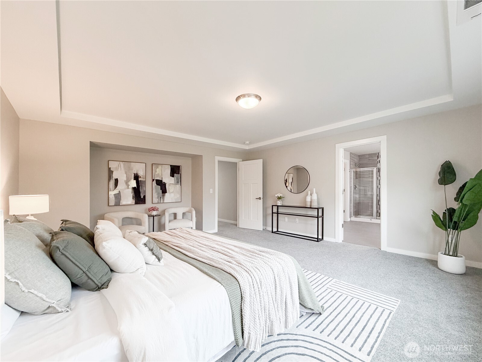 22724 41st Drive Southeast Bothell, WA 98021 - Photo 24 of 40 a bedroom with a bed and a potted plant