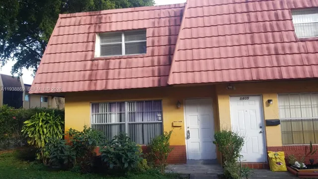 a brick building with a large windows