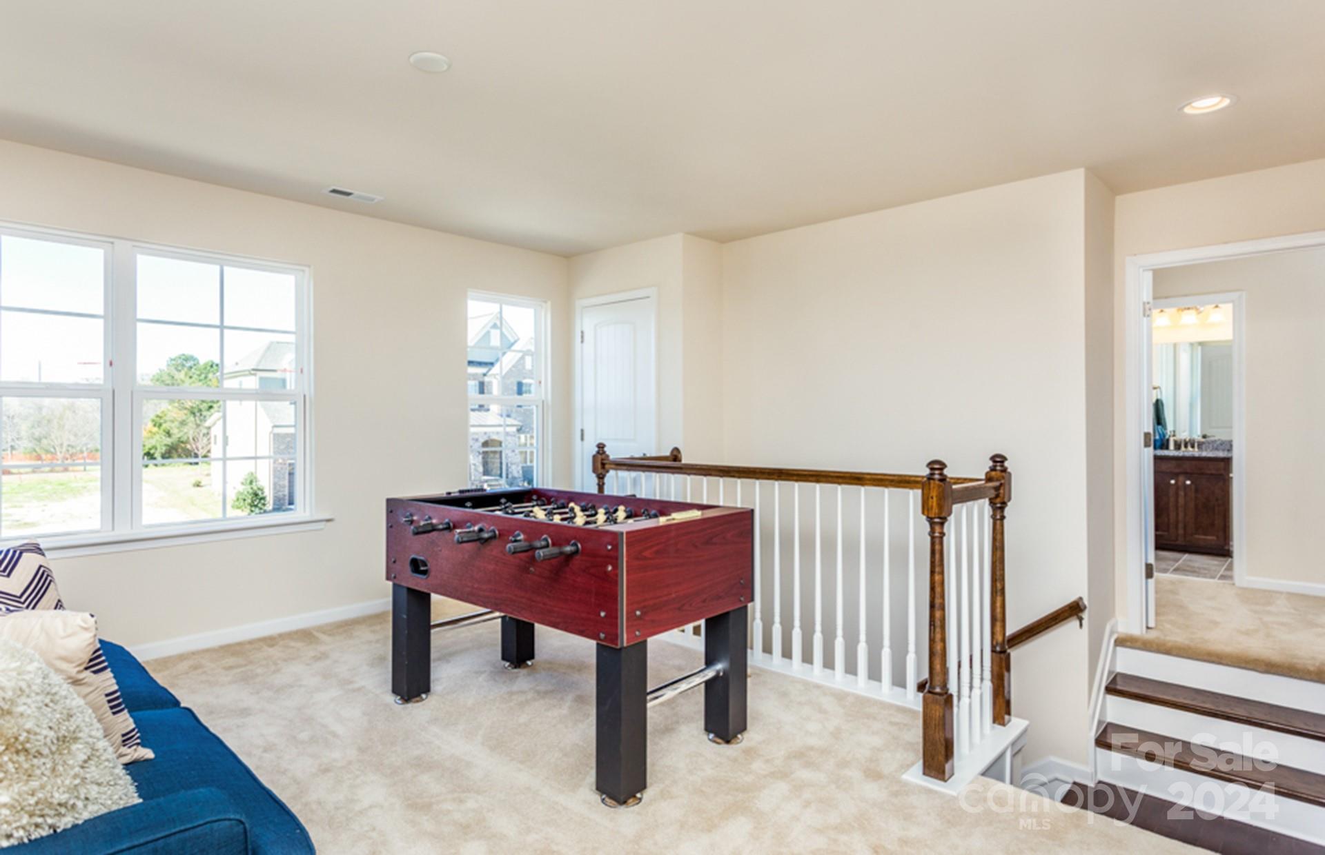 2233 Millenium Drive, Unit 13 Lancaster, SC 29720 - Photo 14 of 15 a living room with furniture and a window