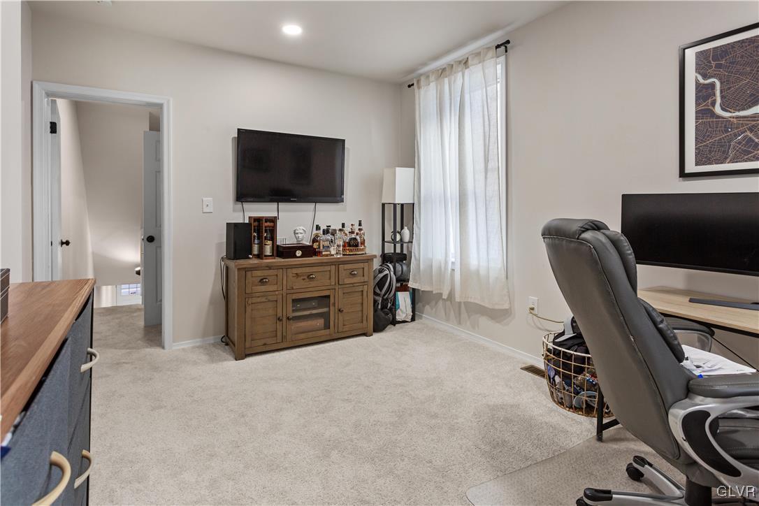 635 3rd Avenue Bethlehem, PA 18018 - Photo 11 of 18 a living room with furniture and a flat screen tv