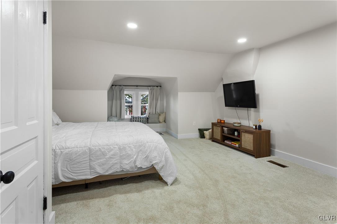 635 3rd Avenue Bethlehem, PA 18018 - Photo 16 of 18 a bedroom with a bed and a flat screen tv