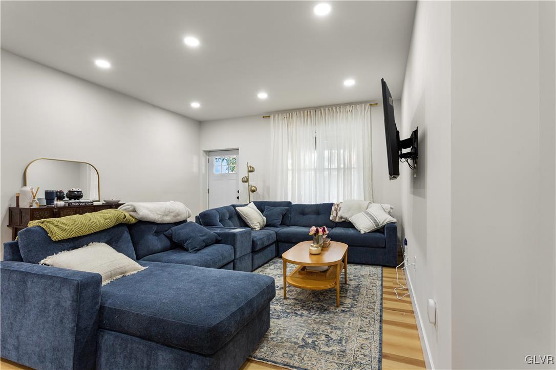 635 3rd Avenue Bethlehem, PA 18018 - Photo 3 of 18 a living room with furniture and a wooden floor