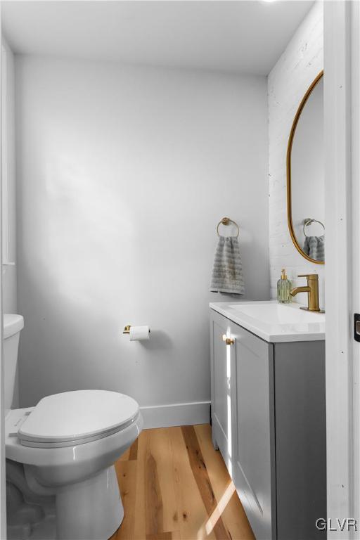 635 3rd Avenue Bethlehem, PA 18018 - Photo 9 of 18 a bathroom with a toilet a sink and mirror