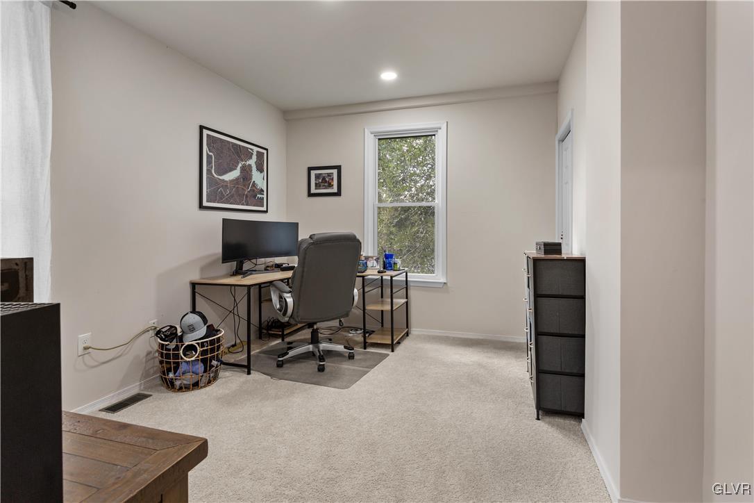 635 3rd Avenue Bethlehem, PA 18018 - Photo 10 of 18 a view of a workspace with furniture and a window