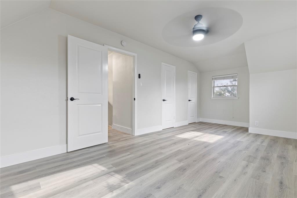706 Commerce Street Euless, TX 76040 - Photo 13 of 28 wooden floor in an empty room