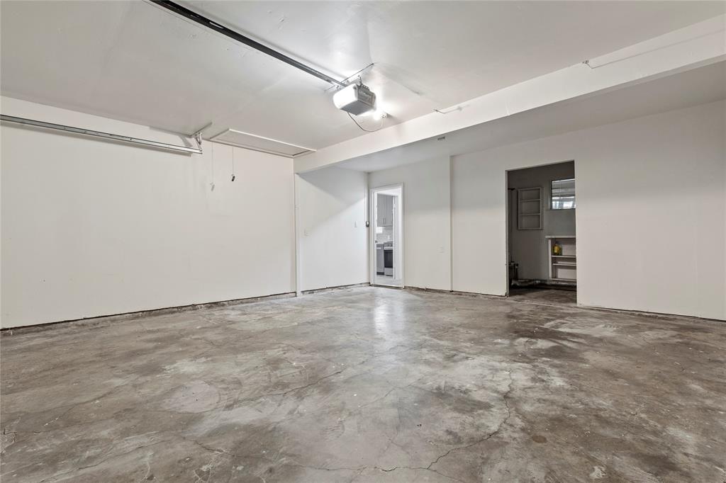 706 Commerce Street Euless, TX 76040 - Photo 19 of 28 a view of an empty room with a ceiling fan
