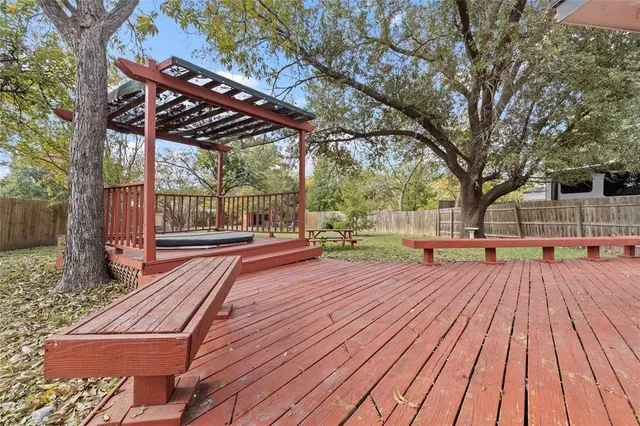 a patio view with a wooden floor space