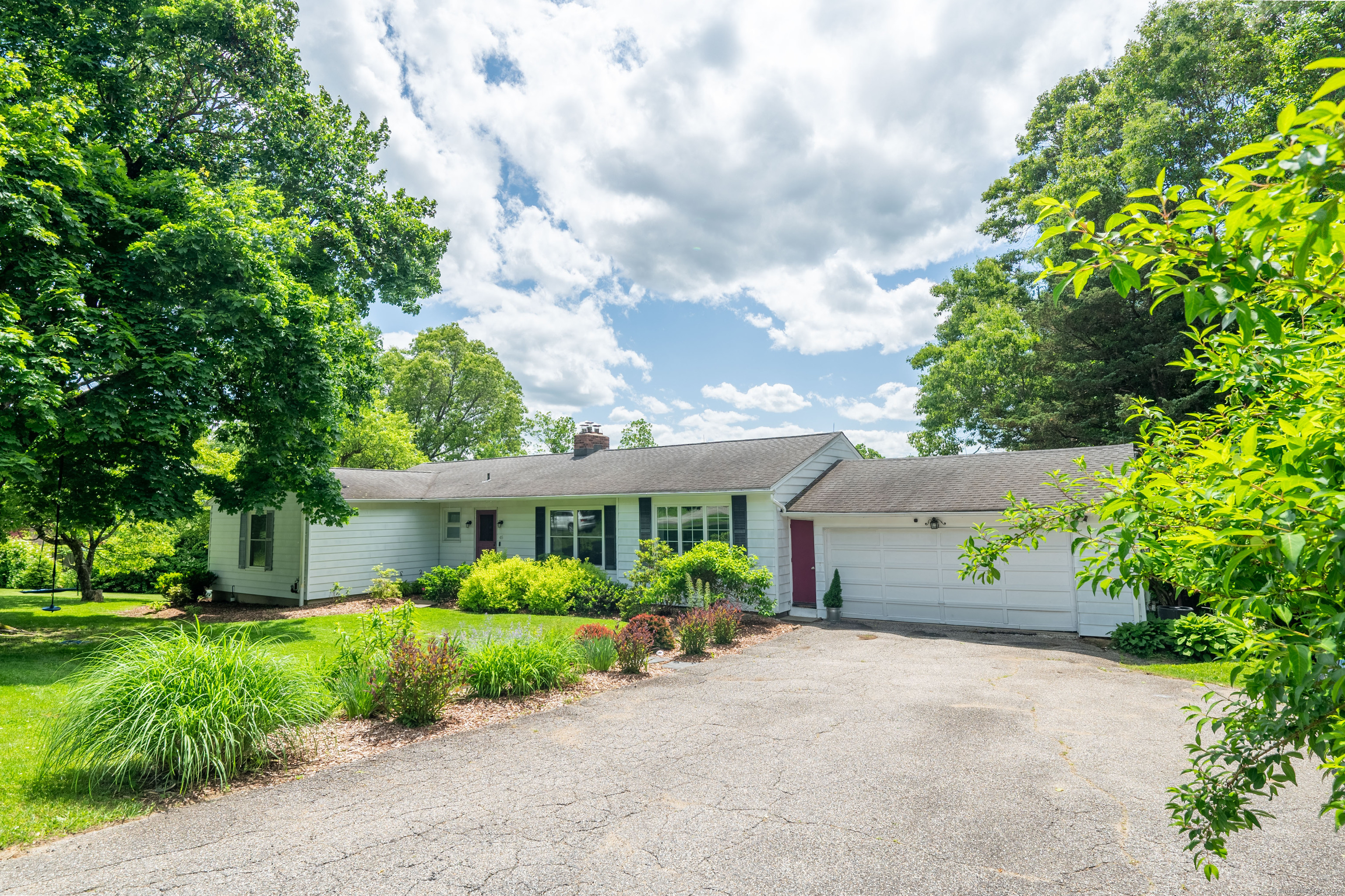 45 High Ridge Road Brookfield, CT 06804 - Photo 1 of 1 a front view of a house with a garden