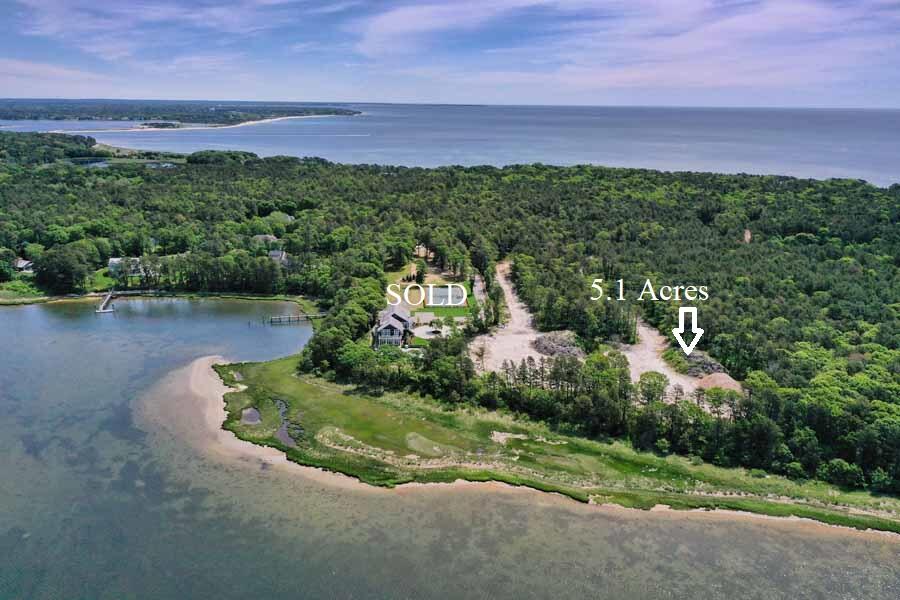 172 Vineyard Road Cotuit, MA 02635 - Photo 4 of 6 a view of a lush green field