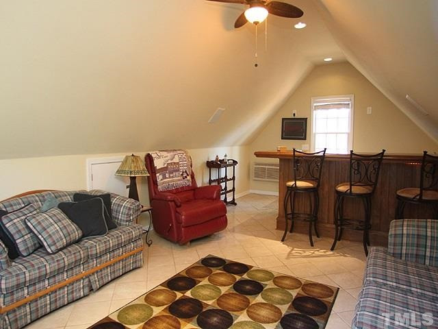5767 Cornwallis Road Garner, NC 27529 - Photo 12 of 17 Room above the garage has a custom built bar. Man Cave / Bonus