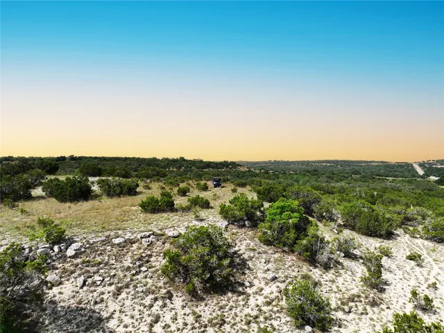 a view of a lake with mountains in the background