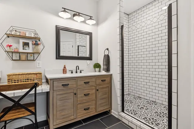 a view of a storage & utility room with two washing machine