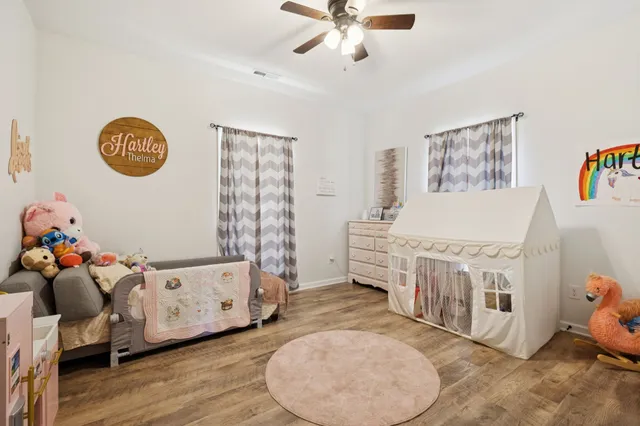 a bedroom with a bed and a closet