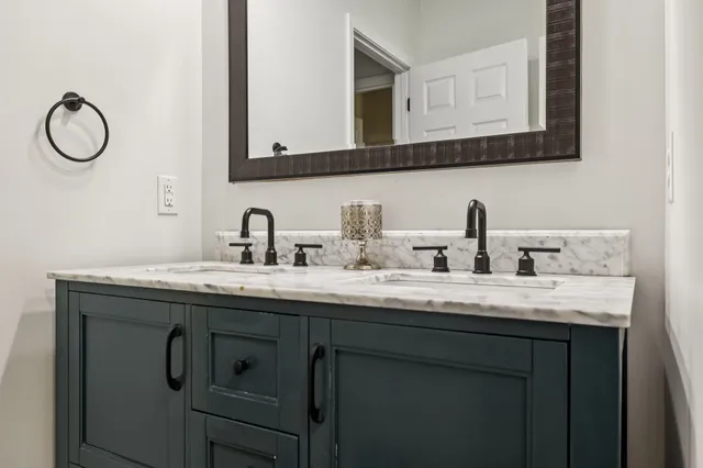 a view of a livingroom with an empty space and a window