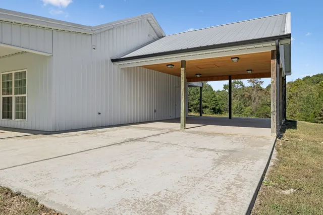 a view of a playground with a tree