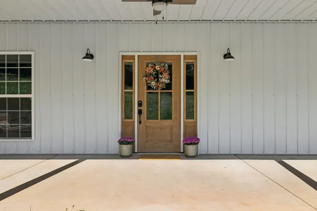 a view of entryway with wooden floor