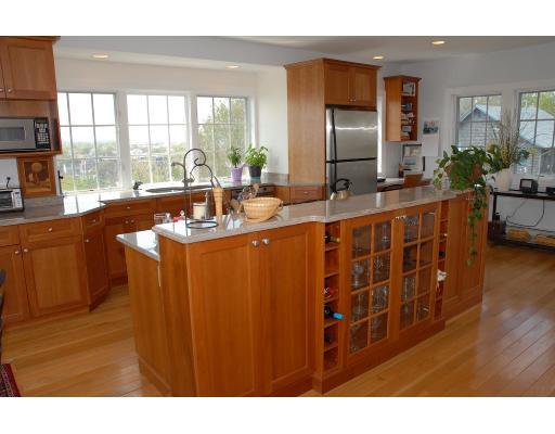 2 Bluff Road Hull, MA 02045 - Photo 6 of 13 a kitchen with stainless steel appliances a sink and a large window