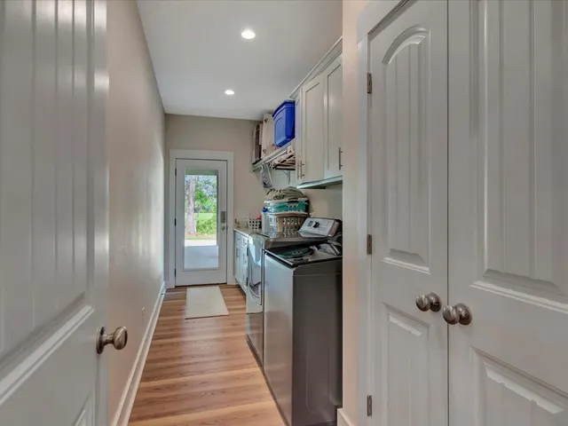 a kitchen with granite countertop a sink and a stove top oven