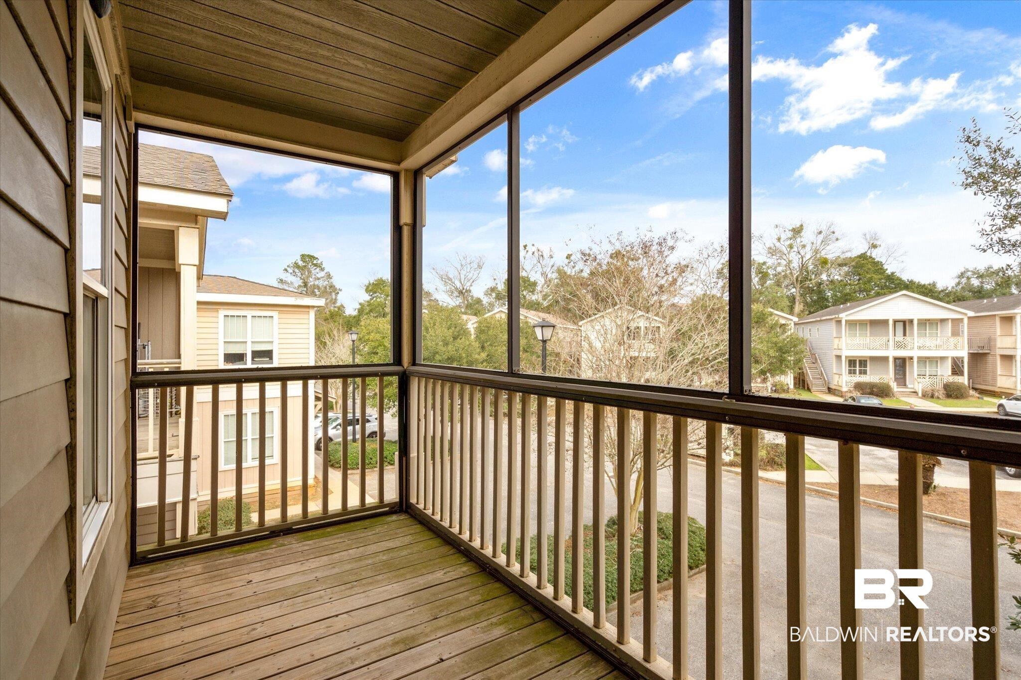 25806 Pollard Road, Unit 209 Daphne, AL 36526 - Photo 19 of 27 Screened-In Back Porch