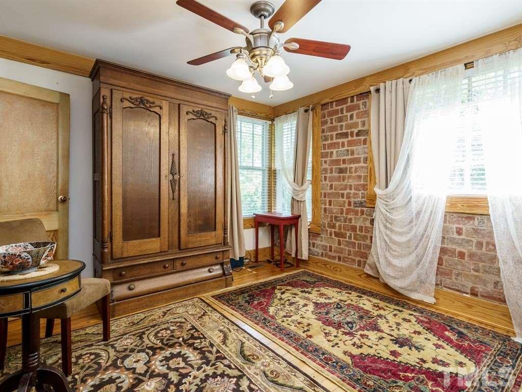 511 Florence Street Raleigh, NC 27603 - Photo 14 of 24 The 1st floor BR enjoys private access to a full bathroom. Most recently it was used as an office and guest room.