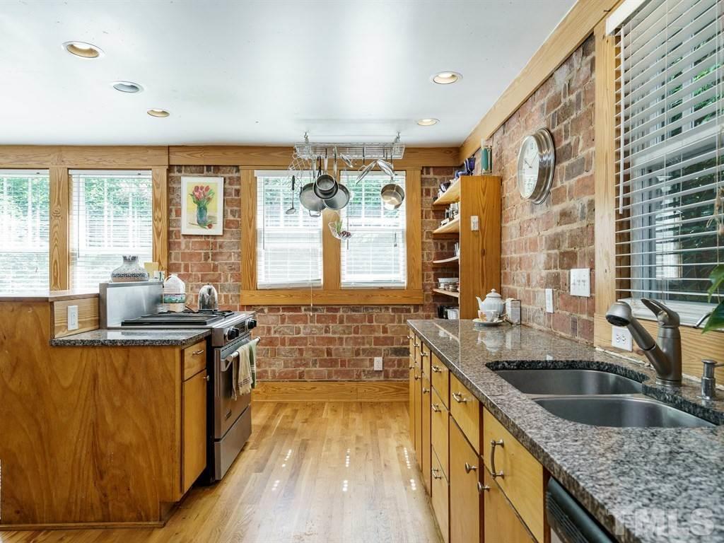 511 Florence Street Raleigh, NC 27603 - Photo 7 of 24 Built-in shelves and cabinets were added throughout by a master carpenter.