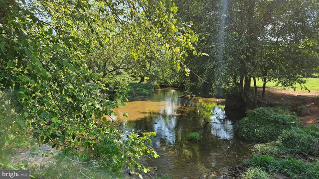 a view of deck with wooden floor and fence
